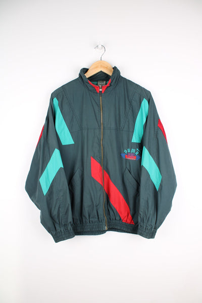 Vintage Puma tracksuit jacket with green and red panel features.Features embroidered logo on the chest.