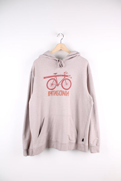 Grey Patagonia hoodie with graphic bicycle print across the chest.