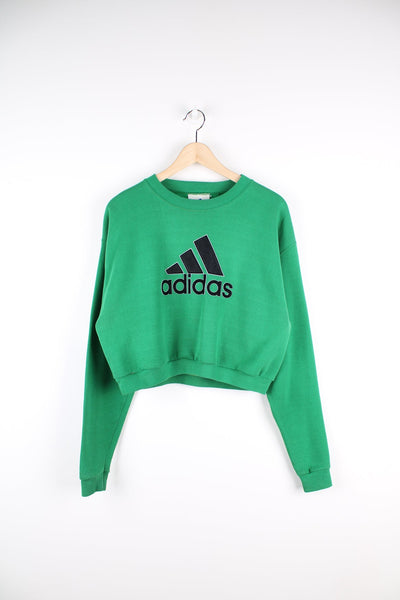 Green cropped vintage Adidas sweatshirt with puff print logo across the chest.
