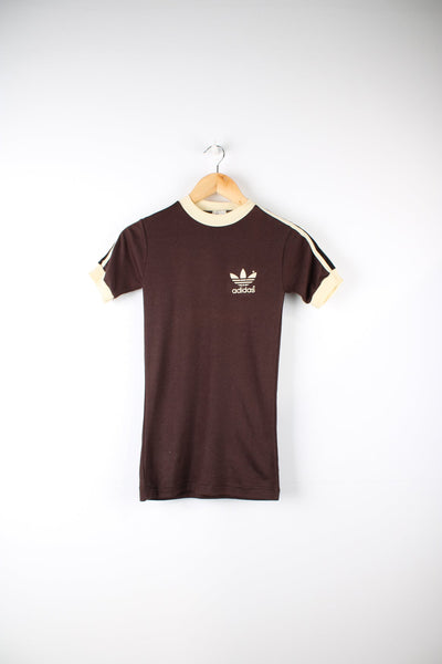 Vintage 80s Adidas T-Shirt in brown with printed logo on the chest.