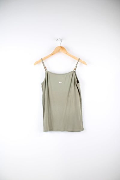 Nike cami top with embroidered logo on the chest and beads on each strap. 