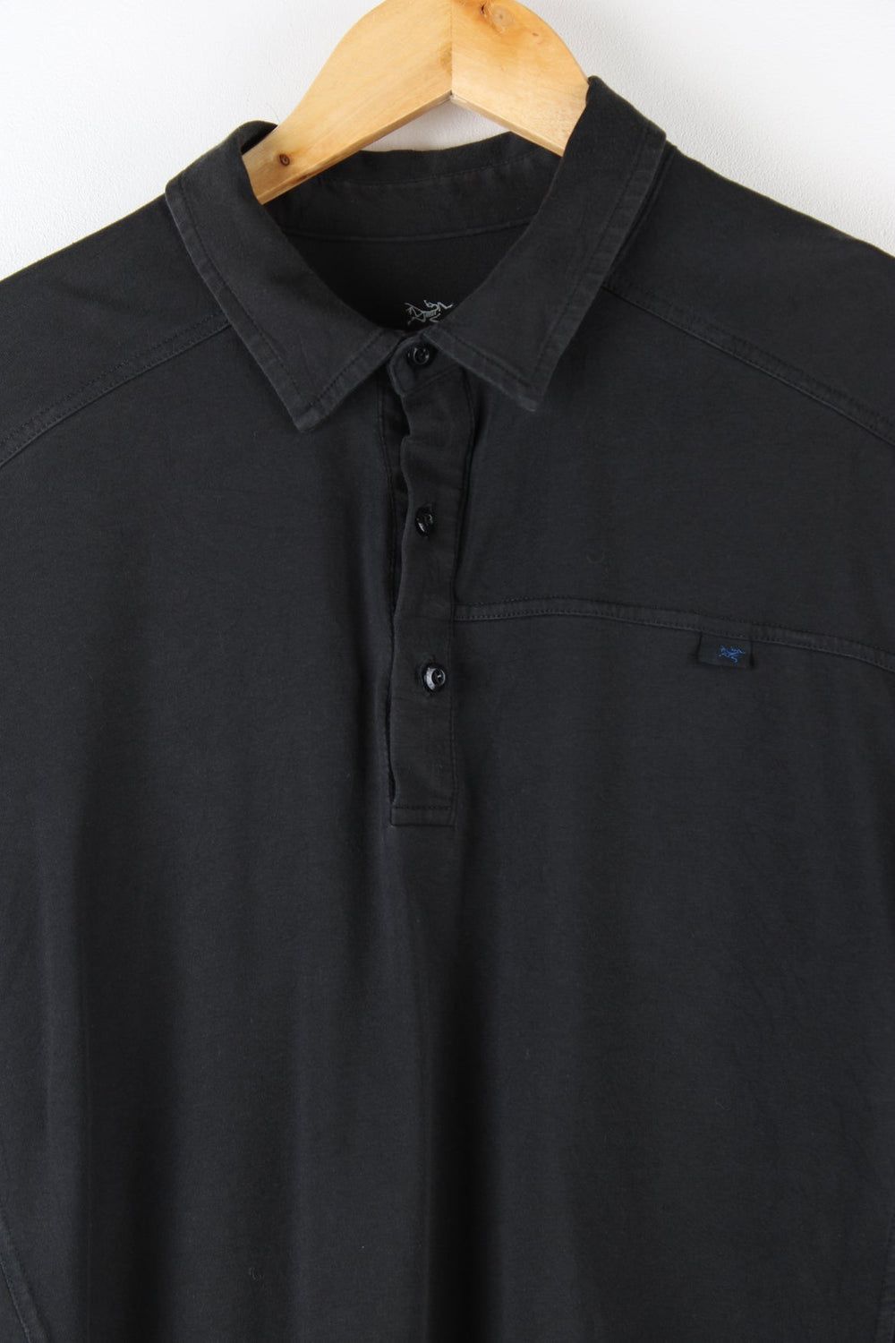 Black Arcteryx Polo Shirt.