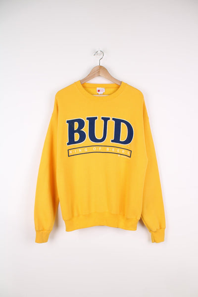 Vintage 90s Budweiser King Of Beers yellow sweatshirt.
