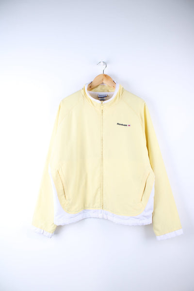 Reebok Classic tracksuit top in yellow.  Features embroidered logo on the chest.