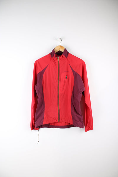 Red and purple Patagonia windbreaker jacket. Features pocket on the chest and embroidered logo.