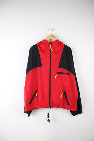 Vintage Marlboro Adventure Team zip through windbreaker jacket in red and black. Features embroidered logo on the sleeve and embroidered velcro badge on the back.