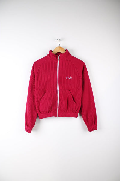 Pink Fila zip through fleece with elasticated waist. Features embroidered logo on the chest.