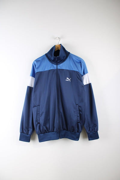 Vintage Puma tracksuit top in blue and white. Features embroidered logo on the chest.