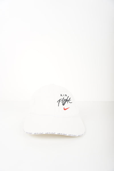 Vintage white Nike Air Flight cap with embroidered swoosh logo and adjustable strap 